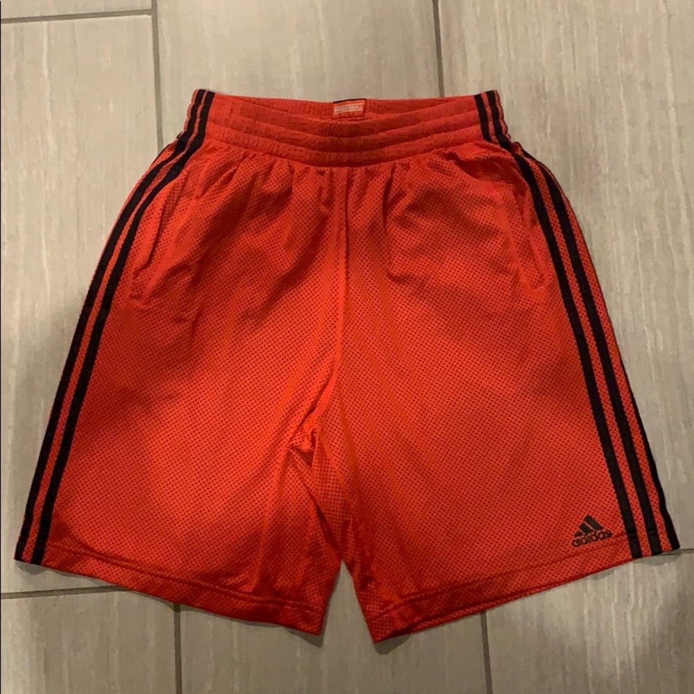 Red adidas basketball shorts